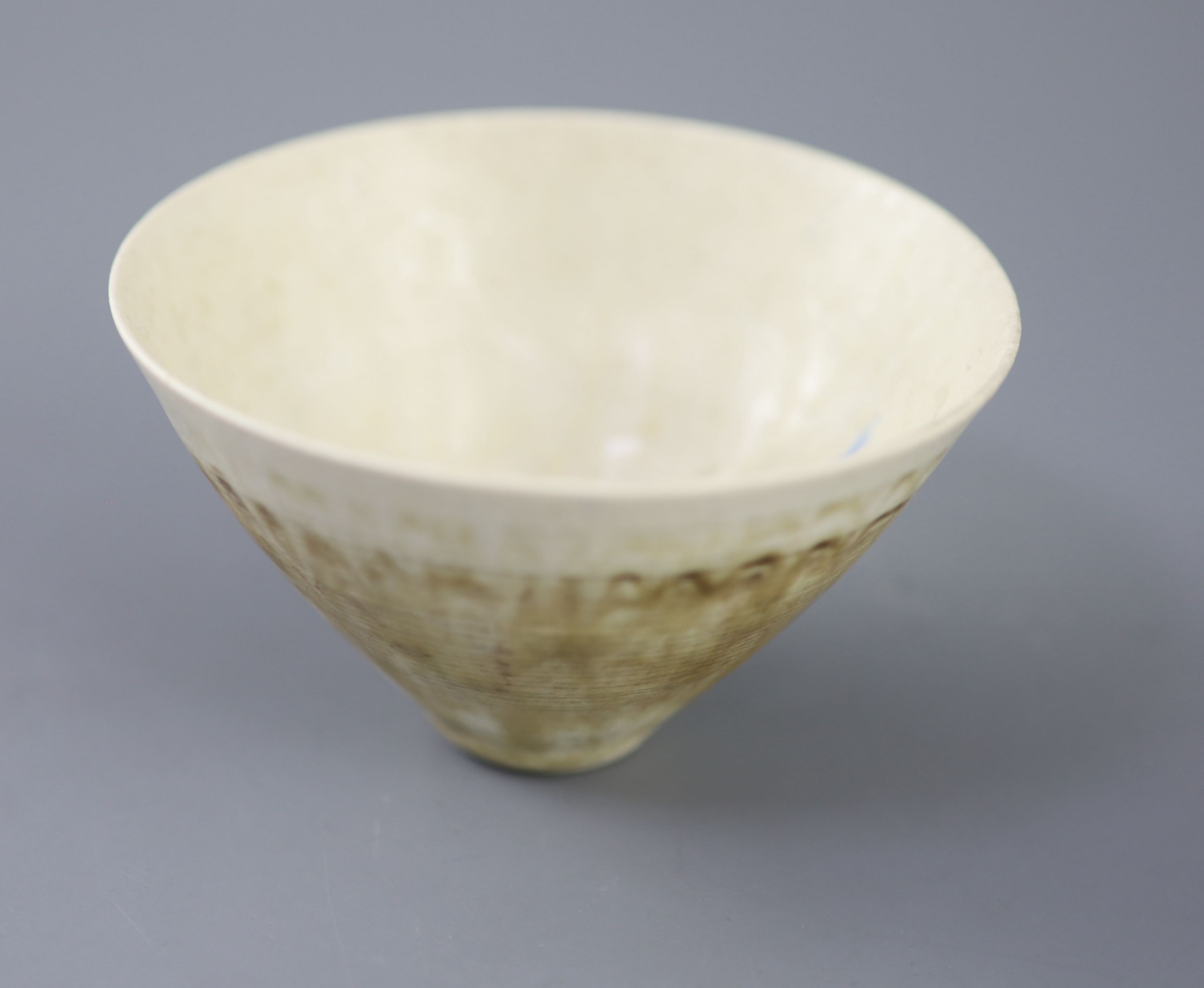 Dame Lucie Rie (1902-1995). A finely potted conical bowl, 10.7cm wide 6.5cm high